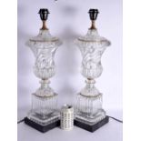 A LARGE PAIR OF CONTEMPORARY GLASS COUNTRY HOUSE LAMPS. 55 cm high.