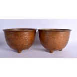 A PAIR OF LATE 19TH CENTURY CHINESE PATINATED MIXED METAL BOWLS decorated with motifs. 19 cm diamete