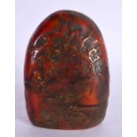 A CHINESE CARVED RED STONE BOULDER 20th Century. 10 cm x 7 cm.