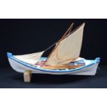 A Model boat 53 x 72 cm