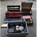 A collection of tools, including powered grinders, torque wrenches, pipe cutter, carpet laying tools