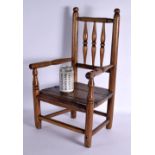 AN EARLY 19TH CENTURY ENGLISH CARVED WOOD CHILDS CHAIR of diminutive form. 54 cm x 31 cm.