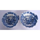 A PAIR OF 19TH CENTURY ENGLISH BLUE AND WHITE DISH LEAF SHAPED DISHES. 20 cm x 20 cm.