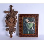 AN ANTIQUE BLACK FOREST CARVED WOOD PLAQUE together with an inlaid wood frame. Largest 42 cm x 10 cm