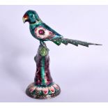 AN EARLY 20TH CENTURY INDIAN SILVER AND ENAMEL JEWELLED FIGURE OF A BIRD decorated with foliage. 116