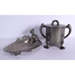AN ART NOUVEAU PEWTER FIGURAL LILY POND DISH together with an Arts and Crafts pewter vase and cover.