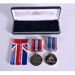A CASED NATIONAL SERVICE MEDAL AWARDED TO W/333332 PTE NM CONWAY ATS FOR SERVICE FROM 1945 TO 1949.