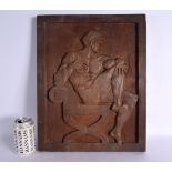 A CHARMING ART DECO CARVED WOOD CLASSICAL PLAQUE depicting a nude muscular male. 45 cm x 35 cm.