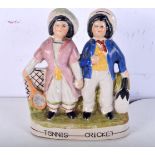 An antique Staffordshire flatback figure of a tennis and cricket player. 19 x 14cm.