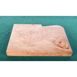 A Ben Oxley designed mouse man style cheese board with knife. 22.5 x 17.5cm.