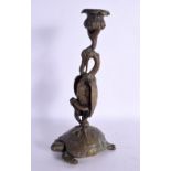 A 19TH CENTURY FRENCH BRONZE CANDLESTICK formed as a bird standing upon a tortoise. 27 cm high.