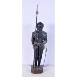 A metal model of a knight in suit of armour 53 cm.
