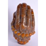 A CHINESE CARVED BUFFALO HORN TYPE BUDDHISTIC HAND SCULPTURE 20th Century. 15.5 cm high.