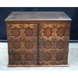 A walnut Arts and Crafts 12 glass topped drawer collectors cabinet 51 x 63 x 44 cm.
