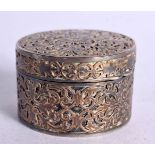 A NIELLO PILL BOX WITH A GILT INTERIOR AND FITTED MIRROR IN LID. 4.2cm x 2.8cm, weight 56g