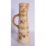Royal Worcester claret jug shape 1047, painted with flowers on a blush ivory ground date mark. 25cm