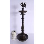 A LARGE 18TH/19TH CENTURY INDIAN BRONZE HOLY OIL CANDLESTICK. 48 cm high.
