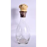 A NOVELTY DOG HEAD DECANTER AND STOPPER. 30 cm high.