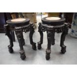 A PAIR OF 19TH CENTURY CHINESE HARDWOOD MARBLE INSET STANDS. 44 cm x 25 cm.