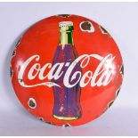 A COCA COLA ENAMEL SIGN. 26 cm diameter.