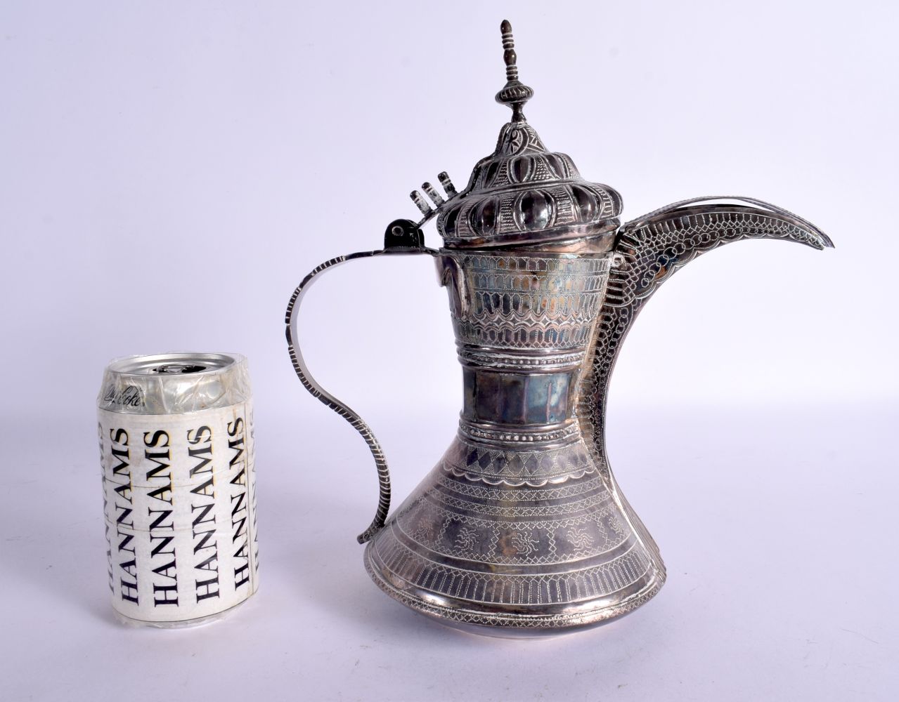 A MIDDLE EASTERN WHITE METAL EWER. 754 grams. 27 cm x 25 cm.