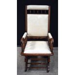 A mahogany upholstered nursing chair 106 x 74 x 55 cm.