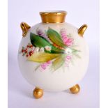 Royal Worcester spherical vase with two handles and three ball feet painted with heathers and other