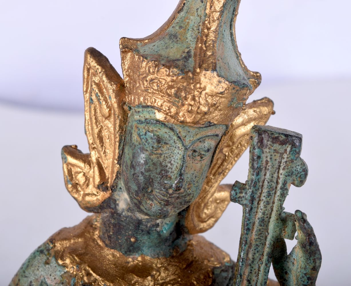 A small South East Asian bronze musician with gilt decoration. 14cm. - Image 4 of 4