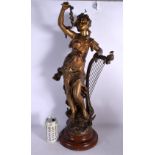 A LARGE ANTIQUE SPELTER FIGURE OF A FEMALE modelled holding a harp. 65 cm high.