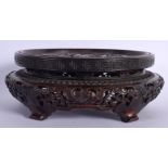 A FINE 19TH CENTURY CHINESE CARVED HARDWOOD OPENWORK STAND Qing, decorated with foliage and rui. 15