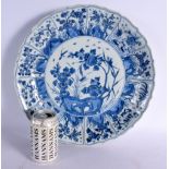 A VERY LARGE 17TH/18TH CENTURY CHINESE BLUE AND WHITE BARBED CHARGER Kangxi/Yongzheng, painted with
