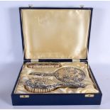 A CASED SILVER DRESSING TABLE SET. Birmingham 1991 & 1992. 514 grams overall. Largest 23.5 cm x 15 c