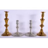 TWO PAIRS OF ANTIQUE CANDLESTICKS. Largest 30 cm high. (4)