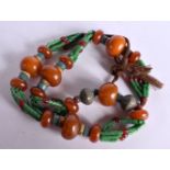 A LARGE MIDDLE EASTERN AMBER TYPE NECKLACE. 323 grams. 110 cm long.