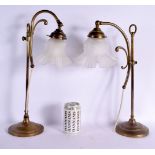 A PAIR OF EARLY 20TH CENTURY BENSON STYLE FROSTED GLASS ADJUSTABLE LAMPS. 47 cm high.