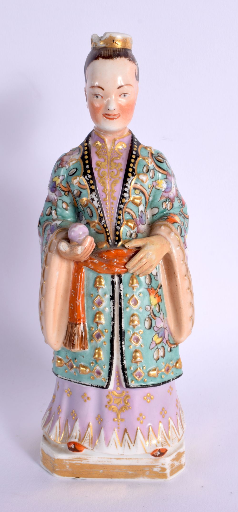 A 19TH CENTURY FRENCH JACOB PETIT PORCELAIN SCENT BOTTLE formed as a female. 18 cm high.