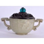 A FINE 18TH/19TH CENTURY CHINESE TWIN HANDLED GREENISH WHITE JADE LIBATION CUP Qing, carved with chi