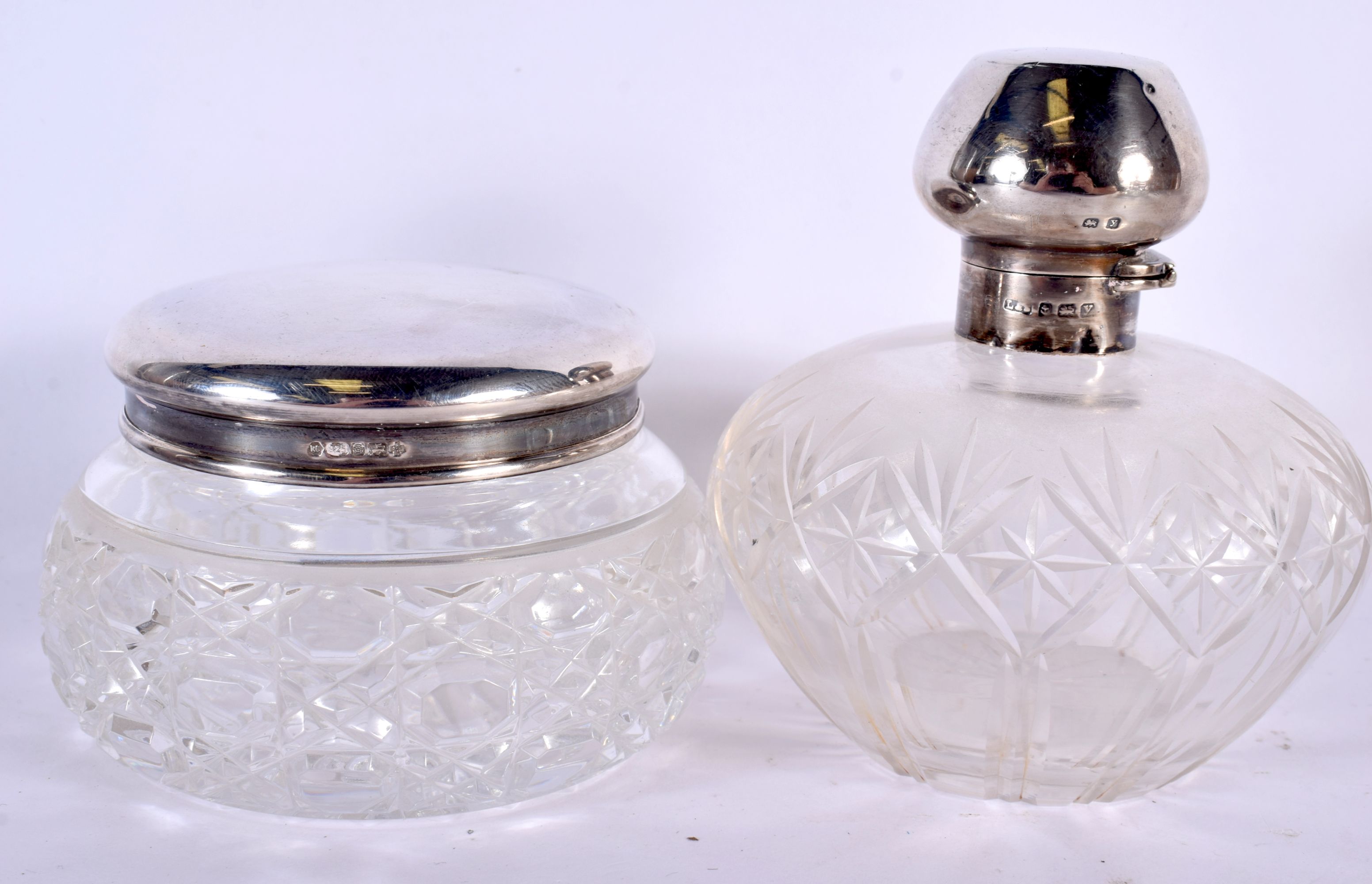 A COLLECTION OF MAINLY ANTIQUE SILVER MOUNTED SCENT BOTTLES in various forms and sizes. Birmingham 1 - Image 7 of 12