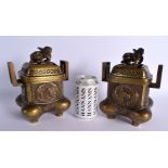 A RARE PAIR OF 19TH CENTURY JAPANESE MEIJI PERIOD TWIN HANDLED CENSERS AND COVERS decorated with bir