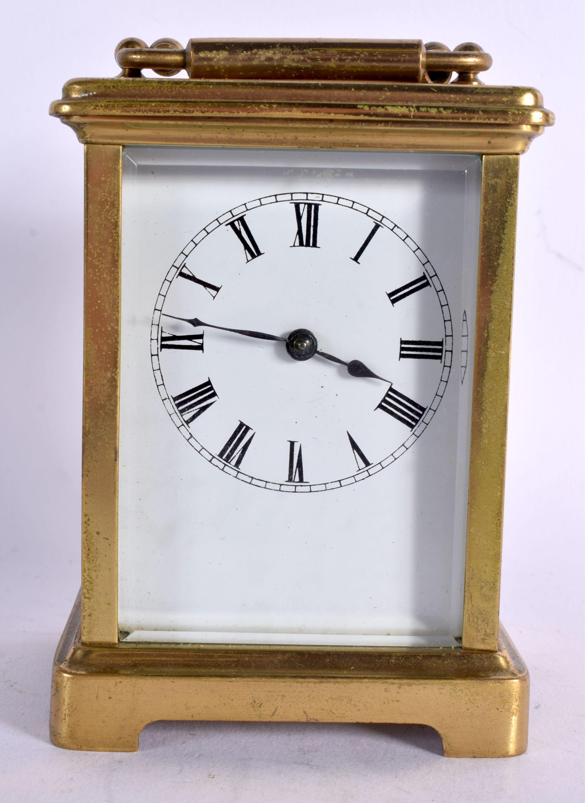 AN EARLY 20TH CENTURY FRENCH BRASS CARRIAGE CLOCK. 13.5 cm high inc handle.