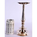 AN UNUSUAL EARLY 20TH CENTURY INDIAN SILVER PLATED OIL LAMP CANDLESTICK. 27 cm high.