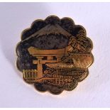 A 19TH CENTURY JAPANESE MEIJI PERIOD KOMAI TYPE BROOCH. 3 cm wide.