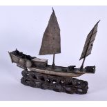 A 19TH CENTURY CHINESE EXPORT SILVER BATTLE SHIP upon a hardwood base. Silver 235 grams. 19 cm x 15