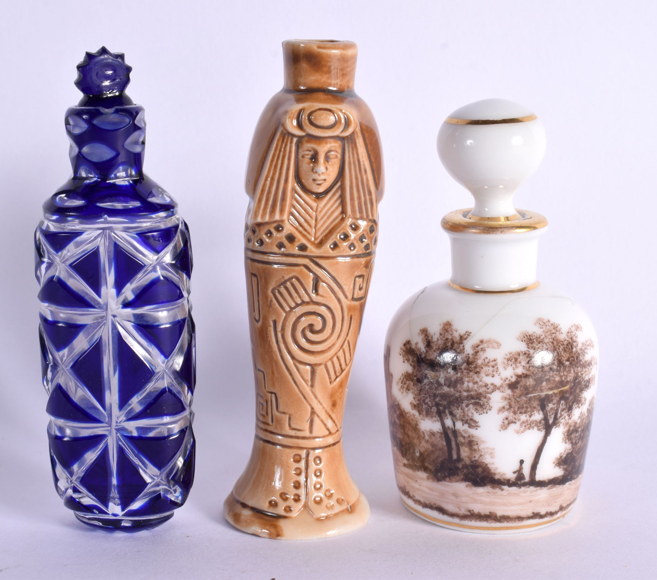 THREE VINTAGE SCENT BOTTLES. Largest 8.5 cm x 2.5 cm. (3)