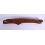A 19TH CENTURY JAPANESE MEIJI PERIOD CARVED WOOD SALMON TYPE HANGING TOGGLE. 19 cm wide.