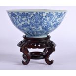 A 19TH CENTURY CHINESE BLUE AND WHITE PORCELAIN BOWL painted with flowers. 18 cm diameter.