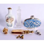 THREE VINTAGE SCENT BOTTLES together with a glass figure of the venus de milo. Largest 7 cm high. (4