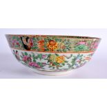 A 19TH CENTURY CHINESE CANTON FAMILLE ROSE PORCELAIN BOWL decorated with typical birds and flora, bo