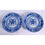 A PAIR OF 19TH CENTURY RILEY BLUE AND WHITE ARMORIAL PLATES with floral borders. 23 cm diameter.