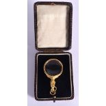 A FINE ANTIQUE 18CT GOLD AND RUBY HORSE HEAD MAGNIFYING GLASS. 13 grams. 5.5 cm x 3 cm.